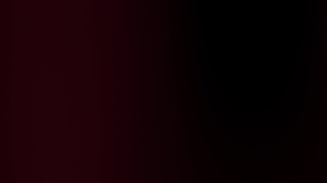 Blurred red blue light flashing on a black background. Emergency light police.