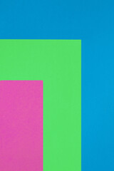 80s style abstract background. Color composition showcasing a minimalist pattern with vivid pink, green, and blue shades in geometric arrangement.