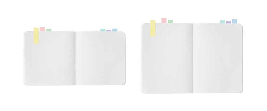 Overhead view of a white notebook with color-coded sticky notes, displaying two spreads: one rectangular and one square.
