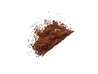 A pile of freshly ground instant coffee powder isolated on a white background. Delicious dark chocolate coffee.