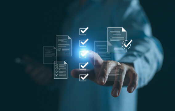 Checklist business performance monitoring concept, Businessman doing online survey filling out check digital form task, online survey question form, target marketing planning with quality control.