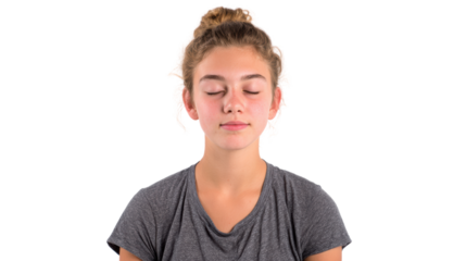 Young woman in a relaxed state, eyes closed, meditating on a white isolate background.