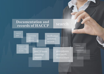 Business woman showing presentation of documentation and record of HACCP on blue background for use in business, company system and training.