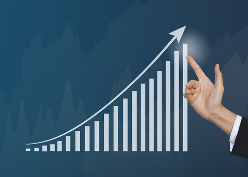 Hand touching growth graphs of financial indicator and accounting market economy analysis chart, business strategy concept.