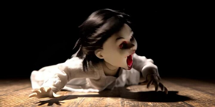 Evil possessed toy girl doll on wood floor being demonic with black background