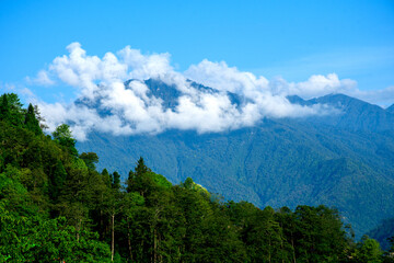 Panoramic view of cloud covered picks of Kanchenjunga mountain range in Sikkim