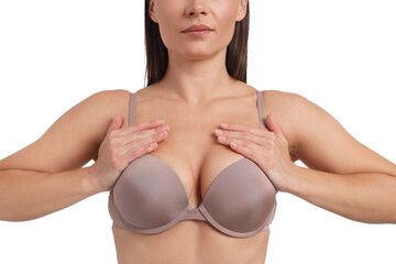 Woman wearing beautiful beige bra on white background, closeup