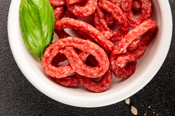 Salami snack mold brezel sausage mini fresh delicious gourmet food background on the table rustic...