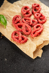 Salami snack mold brezel sausage mini fresh delicious gourmet food background on the table rustic food top view copy space
