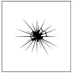 Fototapeta premium A cracked window with a black hole in the center.