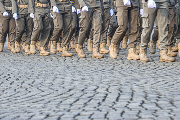 A number of soldiers are marching.