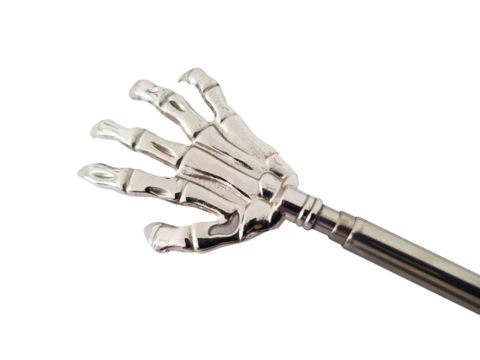 An isolated metal back scratcher in the form of a hand.