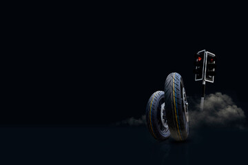High-performance motorcycle tires with smoke on dark background and traffic light concept