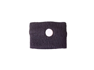 Isolated black anti-nausea bracelet.