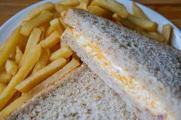London UK, July 14 2025, Freshly Made Tasty Cheese And Onion Sandwich With Chips Or Fries