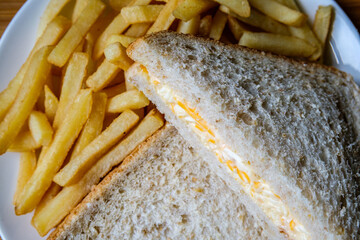 London UK, July 14 2025, Freshly Made Tasty Cheese And Onion Sandwich With Chips Or Fries