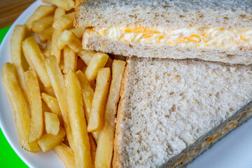 London UK, July 14 2025, Freshly Made Tasty Cheese And Onion Sandwich With Chips Or Fries