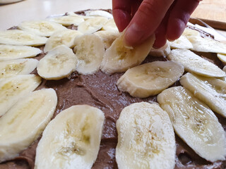 Preparation of chocolate banana cake. Creamy sponge cake,chocolate cake with banana slices,cake recipe.