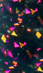 Colorful geometric holographic patterns on a dark background