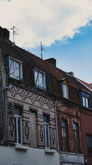 Low-Angle View of Red Brick French Architecture building Facade in Lille, France