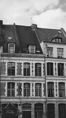 Photo of Brick wall and windows of classical building facade in Lille