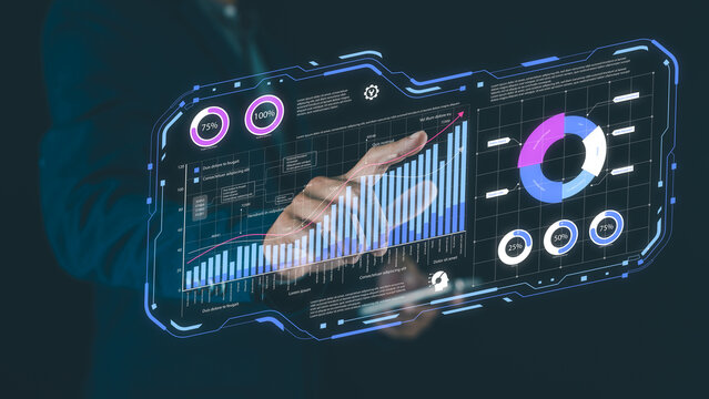 A futuristic transparent digital interface displaying charts, graphs, and data analytics with a hand interacting with it.