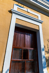 Detail of  facade of antique  house on historic center  of  Cambuy city, Minas Gerais state, Brazil