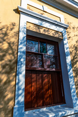 Detail of  facade of antique  house on historic center  of  Cambuy city, Minas Gerais state, Brazil