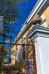 Detail of  facade of antique  house on historic center  of  Cambuy city, Minas Gerais state, Brazil