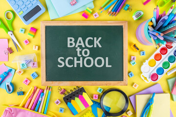 Back to school colorful background containing various school supplies, education accessories for...