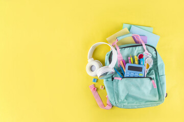 Back to school colorful background containing various school supplies, education accessories for...