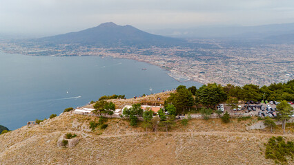 Aerial view of the Monte Faito lookout, Vico Equense with Vesuvius and Naples in the distance. Italy