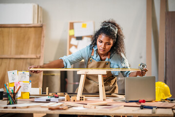 Craftsman Woman Working on Wood Design for Handmade Furniture in Factory Workshop with Focus on...