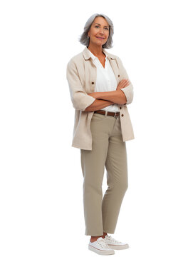 Older Caucasian female casually dressed with arms crossed, full body view, isolated on white or transparent background