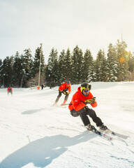 Georgia, Svaneti - 15th february, 2025: Ski rescue team in hastvali ski resort wearing red jackets...