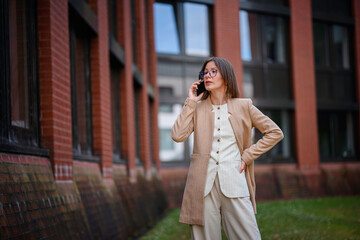 Professional Woman Talking on Phone Outdoors