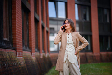 Professional Woman Talking on Phone Outdoors