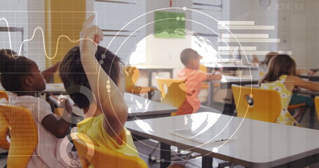 Raising hands, four students sitting at desks in classroom, with digital globe, binary code overlay