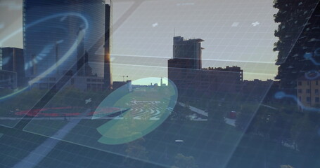 Showing circular holographic graphs and grid on rooftop overlooking city skyline at dusk with park