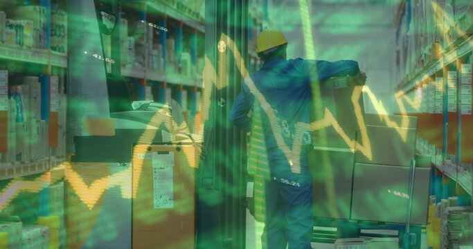 Operating man wearing hard hat coveralls moving in warehouse with forklift, racks and data overlay