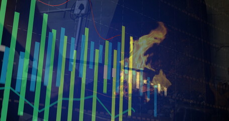 Displaying multicolored bar chart overlaying red line graph on hearth, with burning logs and flames