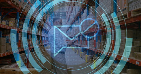 Holding tablet, warehouse manager scanning boxes on metal racks in storage aisle, with data overlay