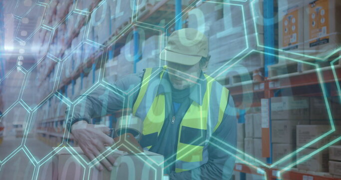 Warehouse worker wearing safety vest sealing boxes with tape dispenser in aisle, with data overlay