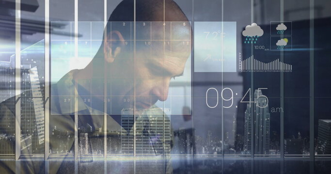 Analyzing overlays, khaki-shirted manager working in office, with city skyline, digital displays