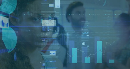 Gazing woman in blazer with headset viewing floating charts via glass panel in office, copy space