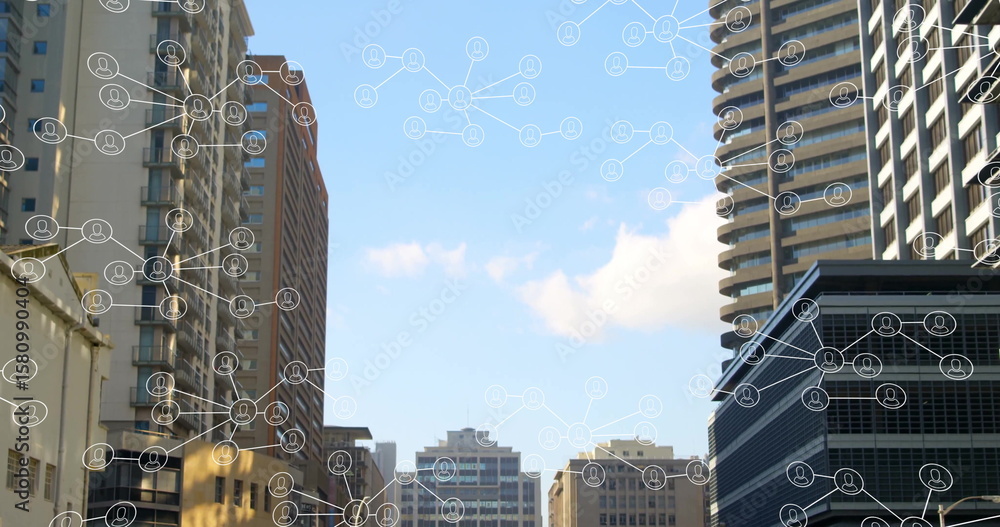 Aufkleber displaying midrise buildings with network overlay in downtown street, with nodes and user icons