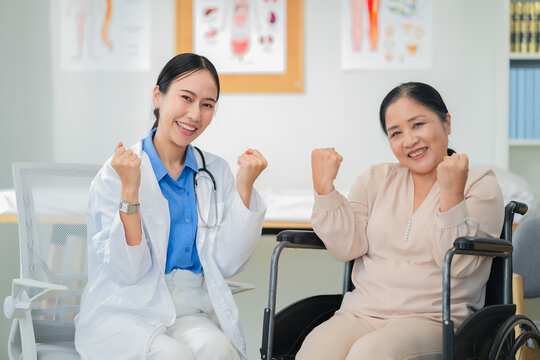 experienced female medical professional explains test results to a female patient during a clinic consultation. reviewing reports and discussing diagnosis and treatment options.compassionate care