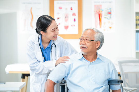 Asian healthcare professionals conduct medical consultations with senior patients using digital technology. Doctor examines elderly woman with stethoscope during comprehensive checkup