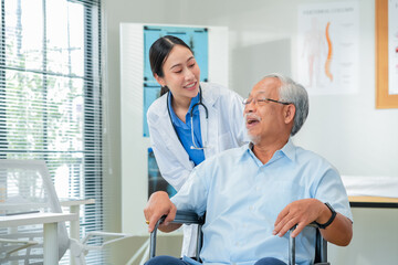 Asian healthcare professionals conduct medical consultations with senior patients using digital technology. Doctor examines elderly woman with stethoscope during comprehensive checkup