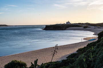 Praia do Farol in Vila Nova de Milfontes, Portugal is located at the mouth of the Mira River on the...